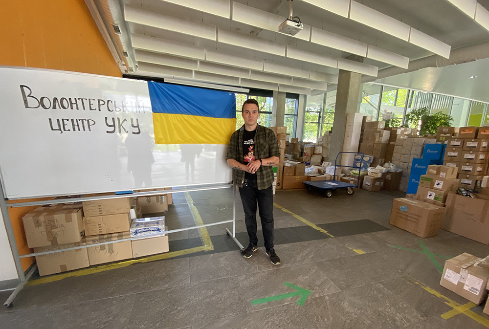 Ostap Machynskyy, 25, head of the rector's office at the Ukrainian Catholic University, shows donations he's collected Sept. 2, 2022, on the college's main campus in Lviv, Ukraine. Machynskyy helped set up an improvised volunteer center at the college to collect gauze, over-the-counter medicine, tourniquets, anything that might come in handy if the war escalates. (Rhina Guidos)