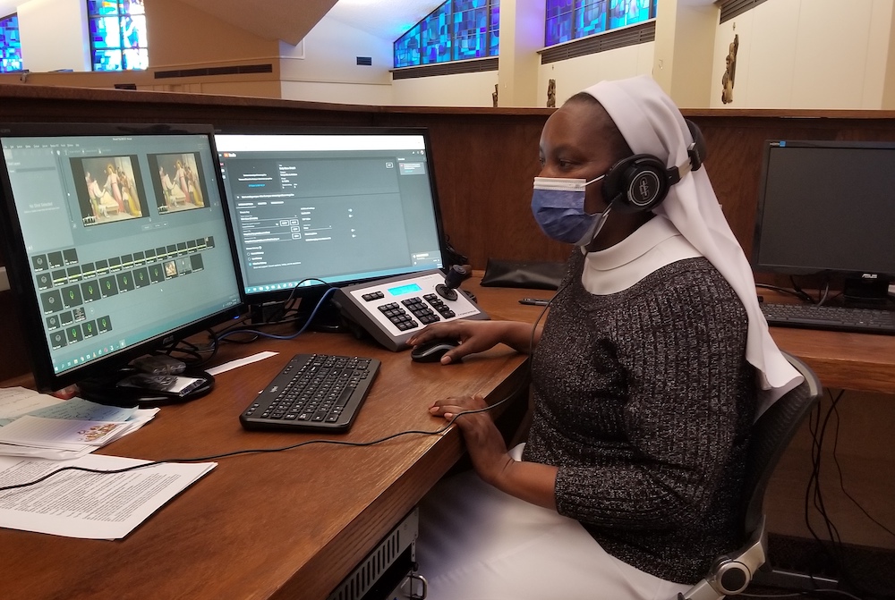 Sr. Teresia Mutiso streams Mass to those unable attend due to the coronavirus pandemic at St. Thomas Aquinas Church in Binghamton, New York. (Provided photo) Sr. Teresia Mutiso streams Mass to those unable attend due to the coronavirus pandemic at St. Thomas Aquinas Church in Binghamton, New York. (Provided photo)