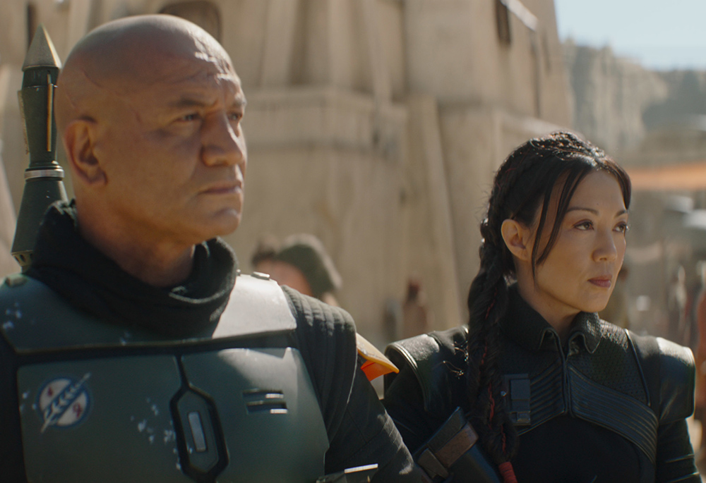 Temuera Morrison, left, is Boba Fett and Ming-Na Wen is Fennec Shand in Lucasfilm's "The Book of Boba Fett," exclusively on Disney+. (Lucasfilm Ltd.) Temuera Morrison, left, is Boba Fett and Ming-Na Wen is Fennec Shand in Lucasfilm's "The Book of Boba Fett," exclusively on Disney+. (Lucasfilm Ltd.)