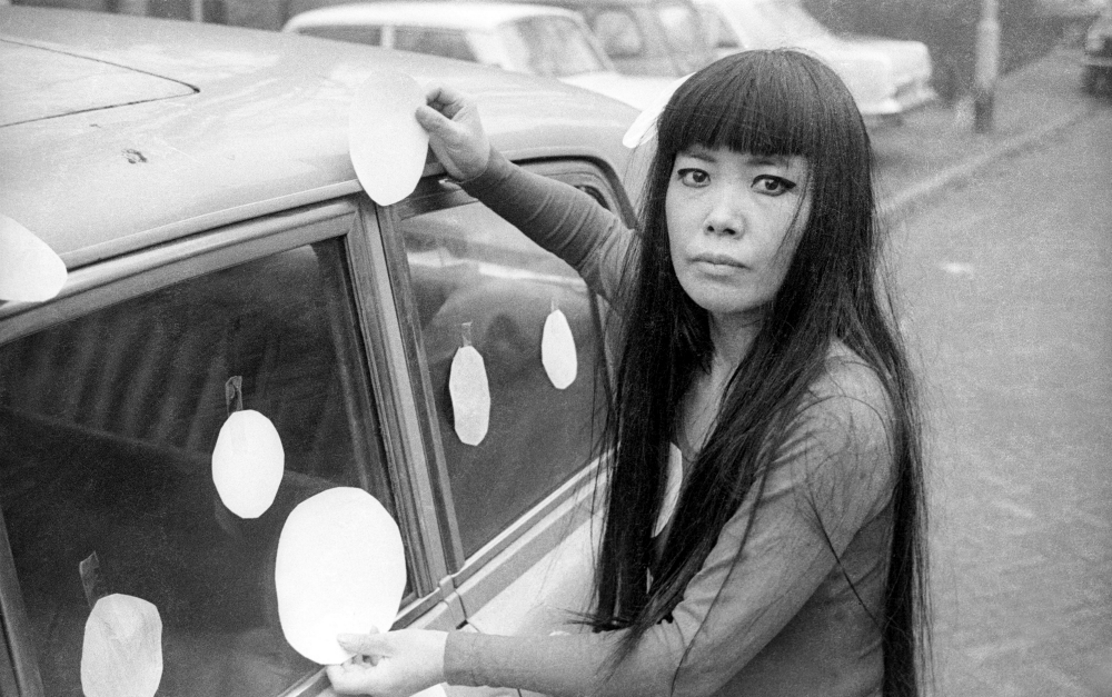 Artist Yayoi Kusama next to her "Dot Car" in 1965 (Courtesy of Magnolia Pictures/Harrie Verstappen) Artist Yayoi Kusama next to her "Dot Car" in 1965 (Courtesy of Magnolia Pictures/Harrie Verstappen)