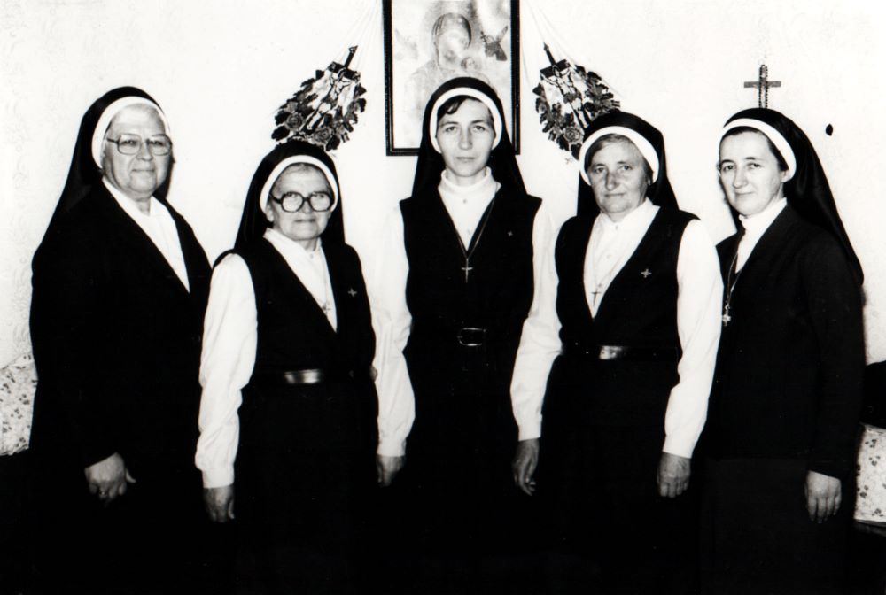 Leaders of Sisters of St. Basil the Great in Italy visit Romanian community leaders in 1989. At the time, the clandestine community in Romania was constantly watched by Communist Party security agents. Sr. Ioana Bota is at center.