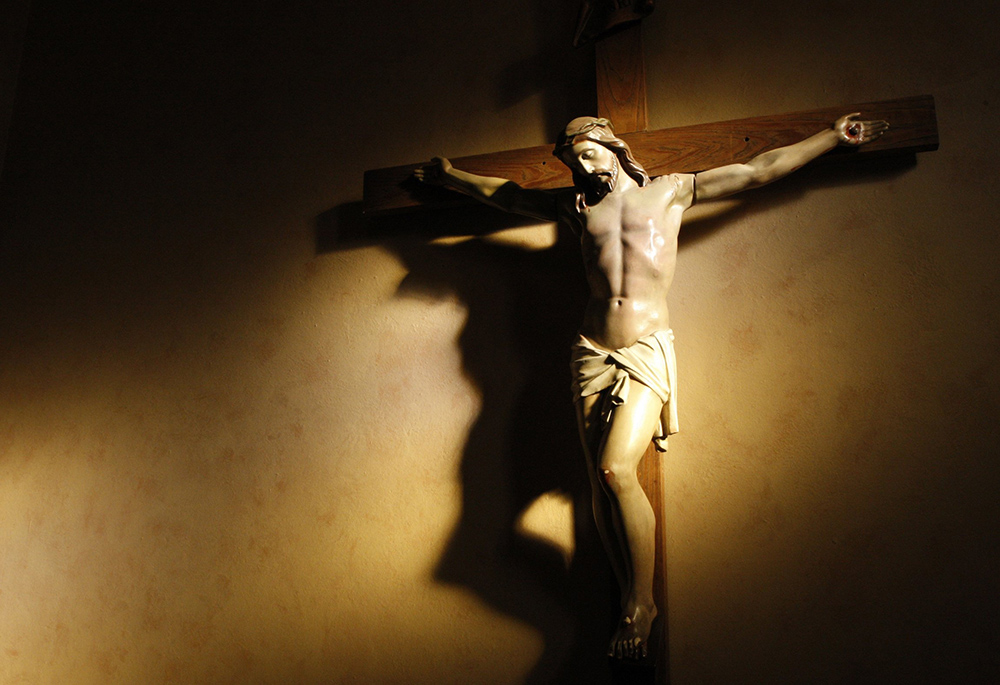 Evening light shines on a crucifix in the vestibule of St. Paul's Basilica in Toronto in this 2008 file photo. In his new book, James Keenan begins his narrative with the New Testament. (CNS/Nancy Wiechec) Evening light shines on a crucifix in the vestibule of St. Paul's Basilica in Toronto in this 2008 file photo. In his new book, James Keenan begins his narrative with the New Testament. (CNS/Nancy Wiechec)