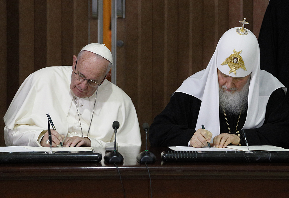 Pope Francis and Russian Orthodox Patriarch Kirill of Moscow sign a joint declaration during a meeting at Jose Marti International Airport Feb. 12, 2016, in Havana. (CNS/Paul Haring) Pope Francis and Russian Orthodox Patriarch Kirill of Moscow sign a joint declaration during a meeting at Jose Marti International Airport Feb. 12, 2016, in Havana. (CNS/Paul Haring)