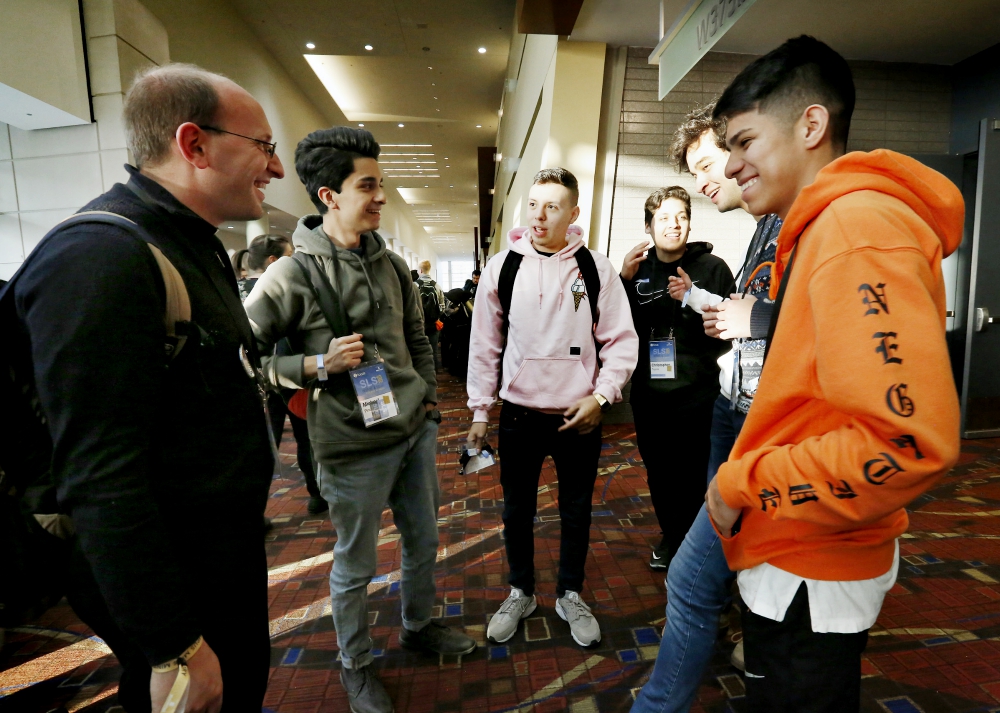 Fr. Bobby Krueger, pastor at St. Leonard Parish in Berwyn, Illinois, visits with young people Jan. 3 during a conference sponsored by the Fellowship of Catholic University Students in Chicago. (CNS/Chicago Catholic/Karen Callaway) Fr. Bobby Krueger, pastor at St. Leonard Parish in Berwyn, Illinois, visits with young people Jan. 3 during a conference sponsored by the Fellowship of Catholic University Students in Chicago. (CNS/Chicago Catholic/Karen Callaway)