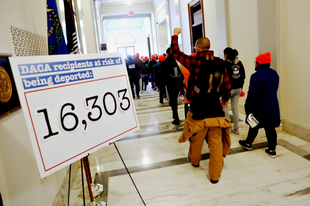 Demonstrators calling for new protections for recipients of the Deferred Action for Childhood Arrivals program walk through a Senate office building on Capitol Hill in late January in Washington. (CNS/Reuters/Jonathan Ernst) Demonstrators calling for new protections for recipients of the Deferred Action for Childhood Arrivals program walk through a Senate office building on Capitol Hill in late January in Washington. (CNS/Reuters/Jonathan Ernst)