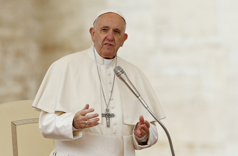 Pope Francis leads a prayer during his general audience in St. Peter's Square at the Vatican April 11. (CNS/Paul Haring) Pope Francis leads a prayer during his general audience in St. Peter's Square at the Vatican April 11. (CNS/Paul Haring)
