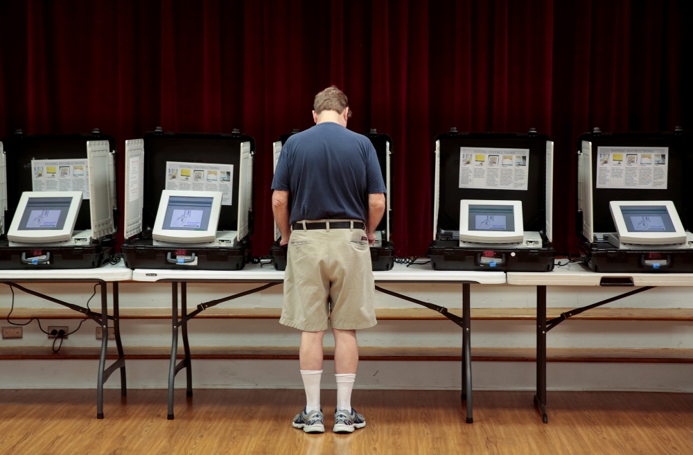 A man casts his vote at Holy Cross Catholic Church in Tucker, Georgia, in a 2017 special election. (CNS/Reuters/Chris Aluka Berry) A man casts his vote at Holy Cross Catholic Church in Tucker, Georgia, in a 2017 special election. (CNS/Reuters/Chris Aluka Berry)