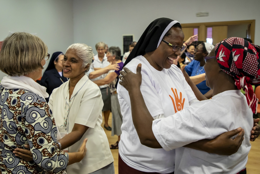 Sisters hug one another in gratitude of the anti-trafficking work they do Sept. 27, the last day of the Talitha Kum 10th anniversary gathering in Rome. (Courtesy of Talitha Kum) Sisters hug one another in gratitude of the anti-trafficking work they do Sept. 27, the last day of the Talitha Kum 10th anniversary gathering in Rome. (Courtesy of Talitha Kum)