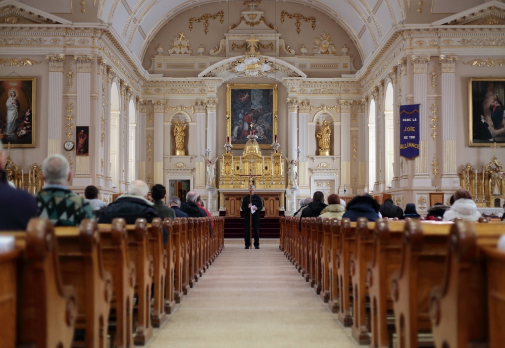 Parishioners from Saint-Charles-Borromée gather inside their 19th-century church in Quebec in 2016. A third of Canada's Christian architecture, some 9,000 churches, will close in the next 10 years, according to the National Trust for Canada. (CNS/Reuters) Parishioners from Saint-Charles-Borromée gather inside their 19th-century church in Quebec in 2016. A third of Canada's Christian architecture, some 9,000 churches, will close in the next 10 years, according to the National Trust for Canada. (CNS/Reuters)