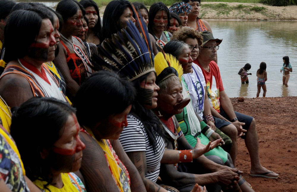 Indigenous people are seen on the banks of the Xingu River during a media event in Brazil's Xingu Indigenous Park Jan. 15, 2020. (CNS/Reuters/Ricardo Moraes) Indigenous people are seen on the banks of the Xingu River during a media event in Brazil's Xingu Indigenous Park Jan. 15, 2020. (CNS/Reuters/Ricardo Moraes)