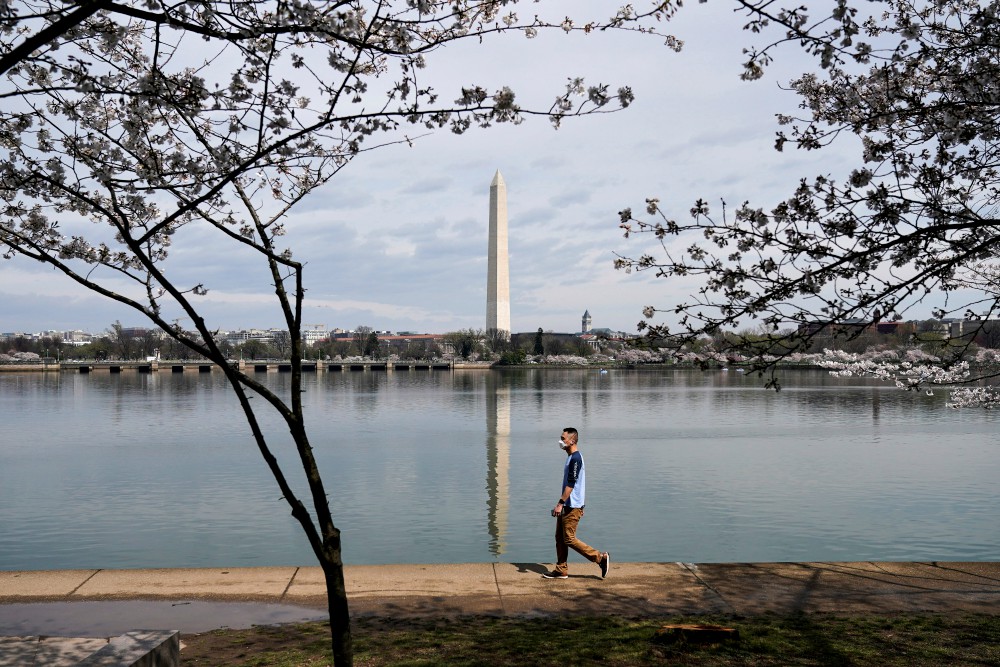 A man in Washington wears a face mask during the outbreak of coronavirus March 19. (CNS/Reuters/Joshua Roberts) A man in Washington wears a face mask during the outbreak of coronavirus March 19. (CNS/Reuters/Joshua Roberts)