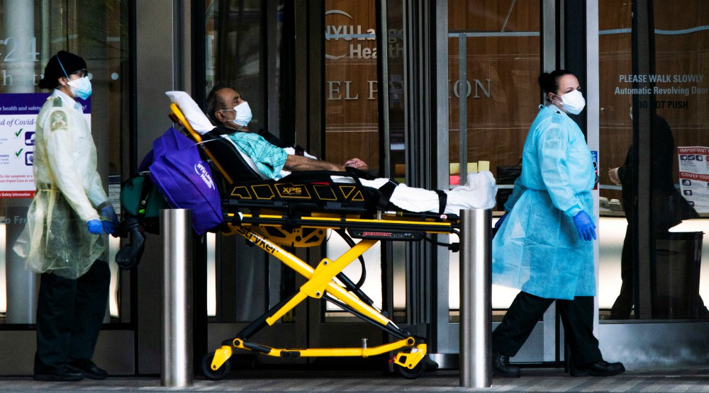 Health care workers move a patient at NYU Langone Hospital in New York City May 3, amid the coronavirus pandemic. (CNS/Reuters/Eduardo Munoz) Health care workers move a patient at NYU Langone Hospital in New York City May 3, amid the coronavirus pandemic. (CNS/Reuters/Eduardo Munoz)