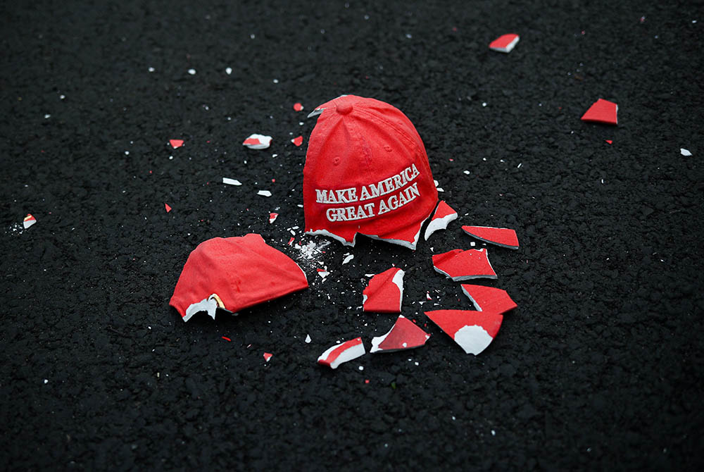 A ceramic "Make America Great Again" hat lies broken on the ground as people gather at Black Lives Matter Plaza in Washington Nov. 3. (CNS/Hannah McKay, Reuters) A ceramic "Make America Great Again" hat lies broken on the ground as people gather at Black Lives Matter Plaza in Washington Nov. 3. (CNS/Hannah McKay, Reuters)