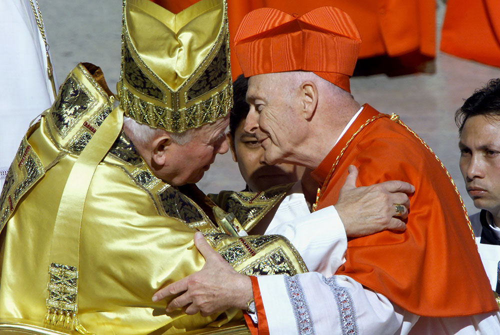 New U.S. Cardinal Theodore McCarrick kisses Pope John Paul II after he received the red biretta during a consistory ceremony in St. Peter's Square at the Vatican Feb. 21, 2001. (CNS/Vincenzo Pinto, Reuters) New U.S. Cardinal Theodore McCarrick kisses Pope John Paul II after he received the red biretta during a consistory ceremony in St. Peter's Square at the Vatican Feb. 21, 2001. (CNS/Vincenzo Pinto, Reuters)