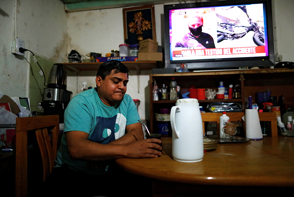 Gustavo Delgado, 52, who lost his job because of the COVID-19 pandemic, drinks a mate Dec. 15, 2020, at his home in Buenos Aires, Argentina. (CNS/Reuters/Agustin Marcarian) Gustavo Delgado, 52, who lost his job because of the COVID-19 pandemic, drinks a mate Dec. 15, 2020, at his home in Buenos Aires, Argentina. (CNS/Reuters/Agustin Marcarian)