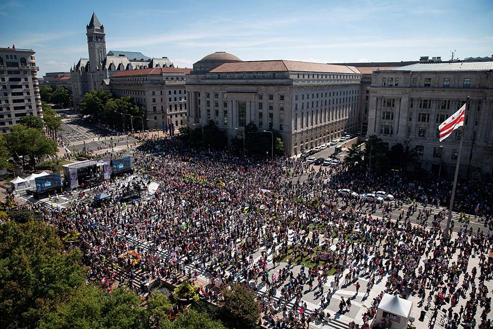 Supporters of legal abortion rally at Freedom Plaza in Washington before marching to the U.S. Supreme Court Oct. 2, during the nationwide Women's March protesting a new Texas law that bans most abortions after six weeks of pregnancy. (CNS/Reuters/Al Drago