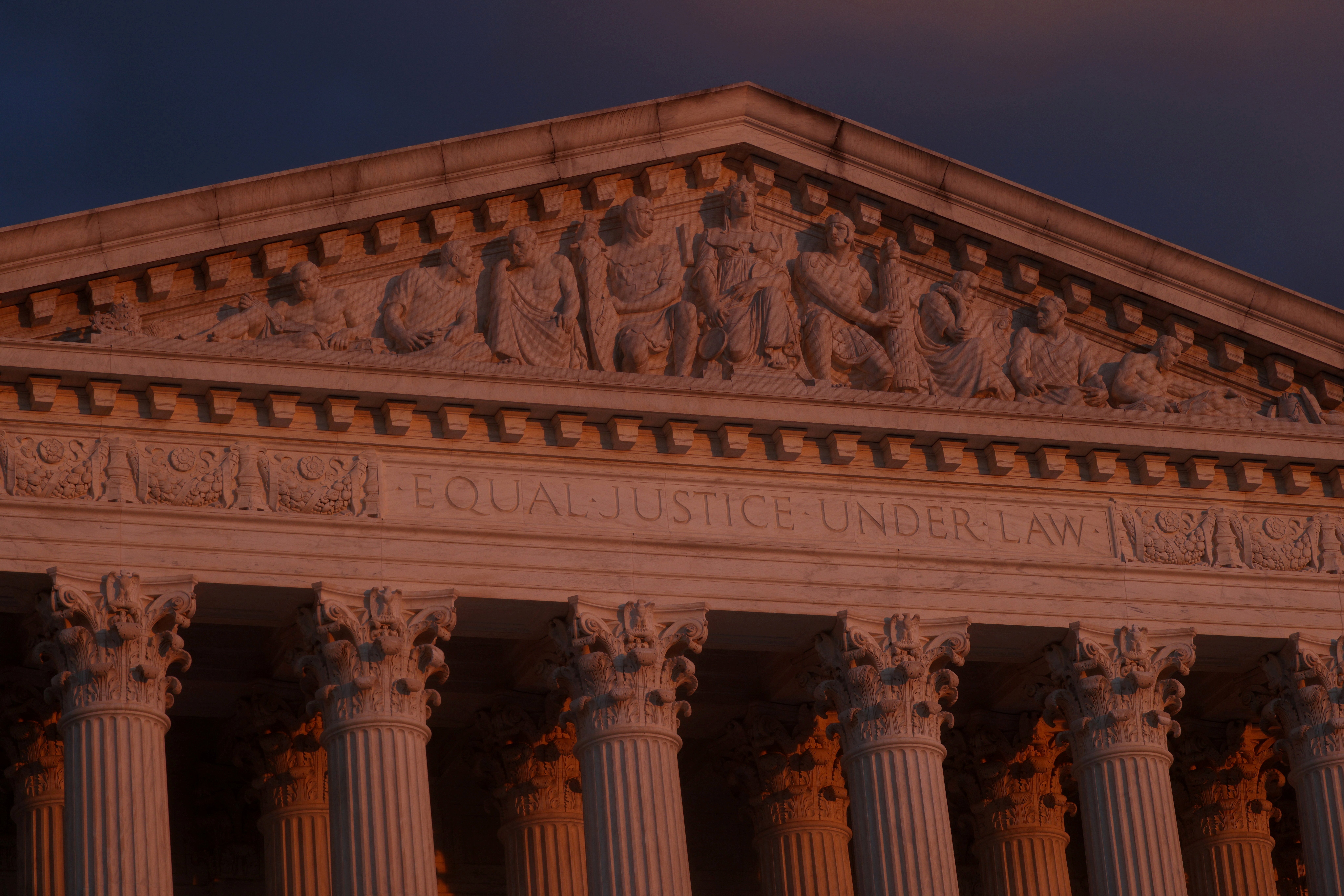 The sun sets at the U.S. Supreme Court building in Washington Nov. 29, 2021. (CNS photo/Leah Millis, Reuters)