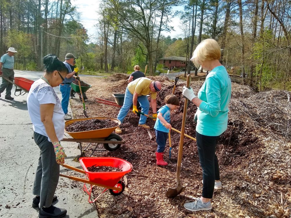 Parishioners of St. John Neumann Church in Lilburn, Ga., work on the parish garden in 2020. (CNS/courtesy St. John Neumann Church)