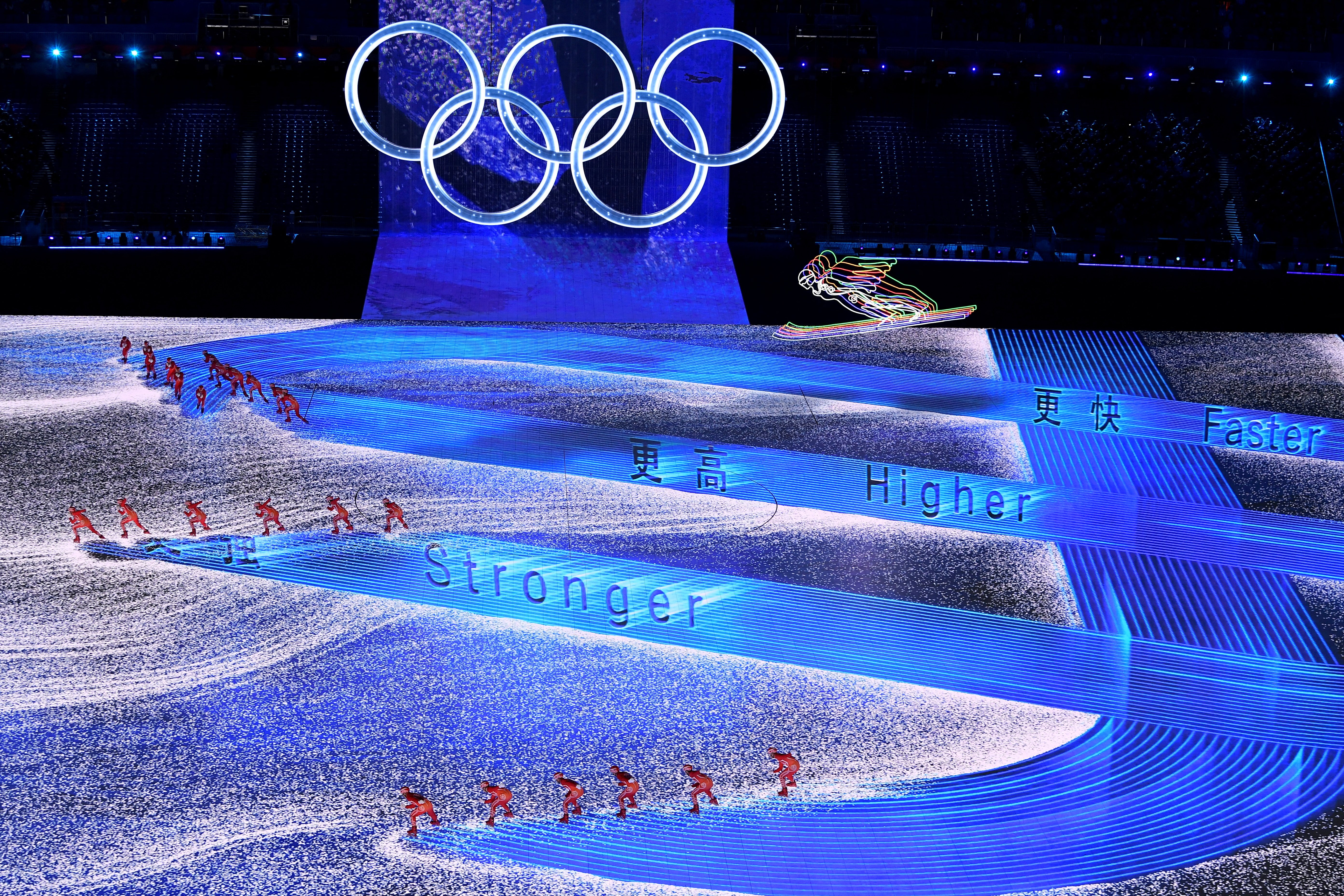 Performers are pictured under the Olympic rings during the opening ceremony of the Winter Olympics at National Stadium in Beijing Feb. 4. (CNS/Reuters/Toby Melville)