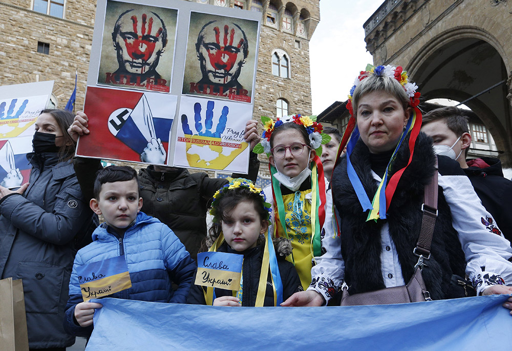 Ukrainians living in Italy protest against the war in Ukraine in Piazza della Signoria Feb. 27 in Florence, Italy. (CNS/Paul Haring) Ukrainians living in Italy protest against the war in Ukraine in Piazza della Signoria Feb. 27 in Florence, Italy. (CNS/Paul Haring)
