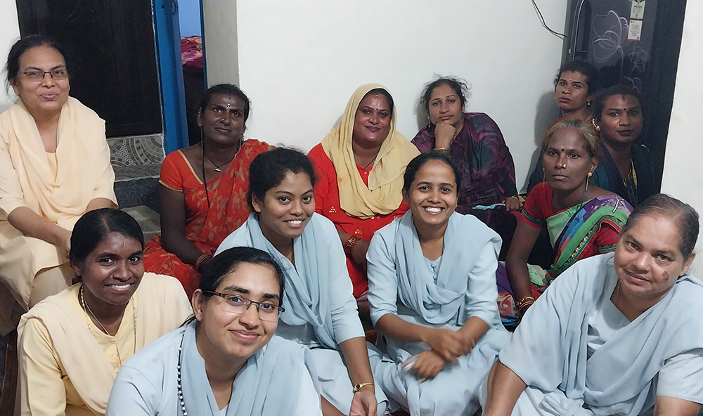 Fatima Sr. Roseline Jose, far right, with novices and two sisters from the Society of Sisters of St. Ann of Luzern with a group of transgender women
