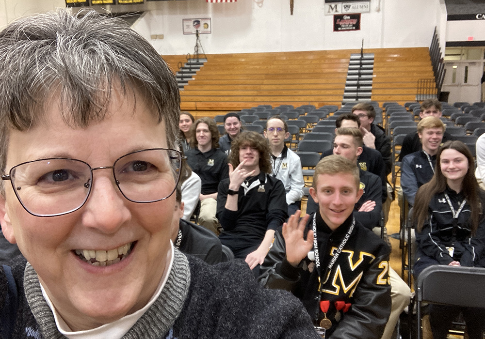 Springfield Dominican Sr. Beth Murphy poses for a selfie with students at the congregation's Marion Catholic High School in Chicago Heights, Illinois, during a recent school celebration of Catholic sisters. (Courtesy of Beth Murphy)