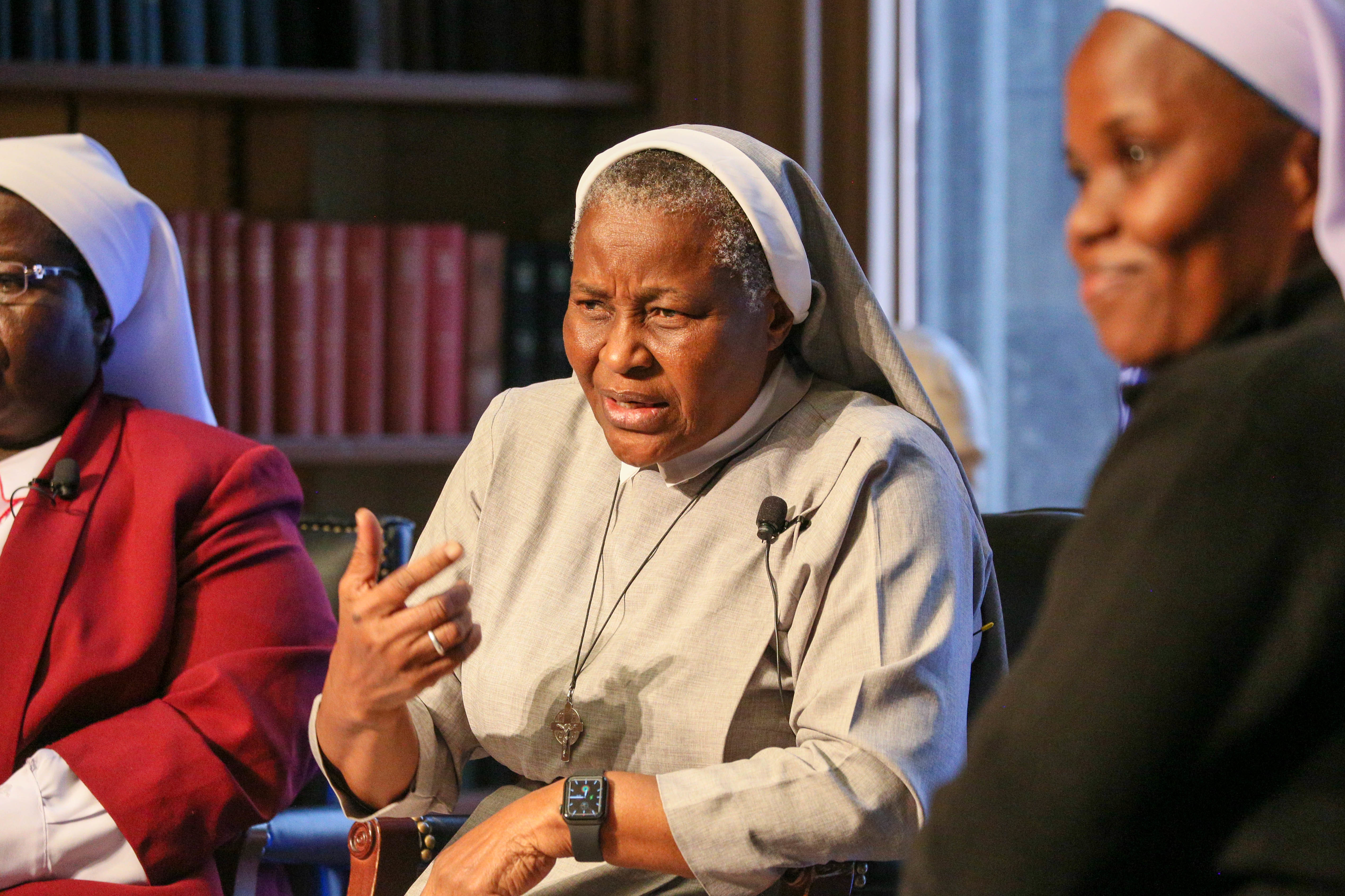 Sr. Francisca Ngozi Uti of Nigeria, center, makes a point during an April 25 forum at Georgetown University. She is flanked by Ugandan Srs. Rosemary Nyirumbe, left, and Sr. Hedwig Muse. All are participants in the first cohort of the Women in Faith Leadership Fellowship, a jointly-sponsored program whose aim is to raise “the visibility, vitality and voice of Catholic sisters.” (Courtesy of Georgetown University)