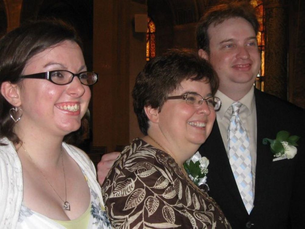 Josephite Sr. Lynn Caton celebrates final vows Sept. 8, 2012 with her son and daughter-in-law. (Courtesy of Lynn Caton)