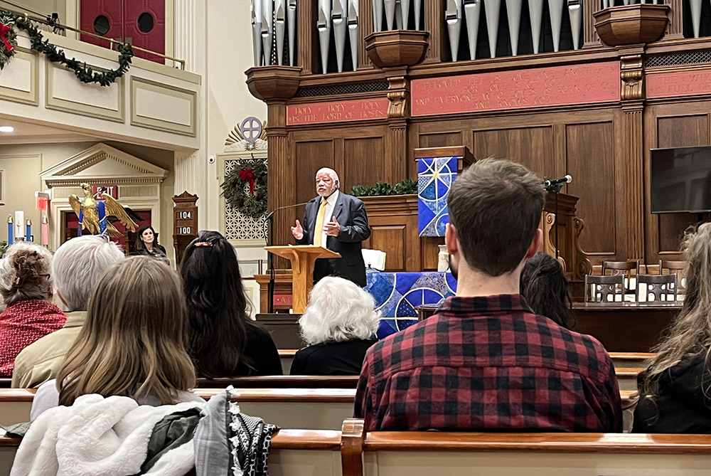 The Rev. Tyronne Pitts, general secretary emeritus of the Progressive National Baptist Convention Inc, speaks at a cease-fire service at New York Avenue Presbyterian Church in Washington, D.C., on Dec. 11. (NCR photo/Aleja Hertzler-McCain)