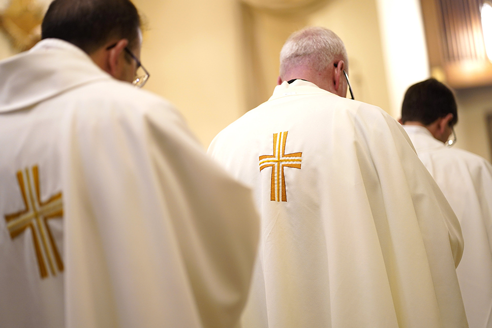 Priests are seen during a special Mass for vocations at Curé of Ars Church in Merrick, New York, Aug. 4, 2022, the feast of St. John Vianney, patron of parish priests. (CNS/Gregory A. Shemitz)