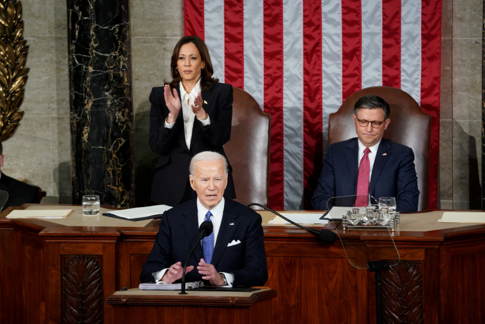 President Biden delivers State of the Union address. President Biden delivers State of the Union address on March 7, 2024. Behind him, Vice President Kamala Harris stands applauding, and Speaker of the House Mike Johnson sits listening.