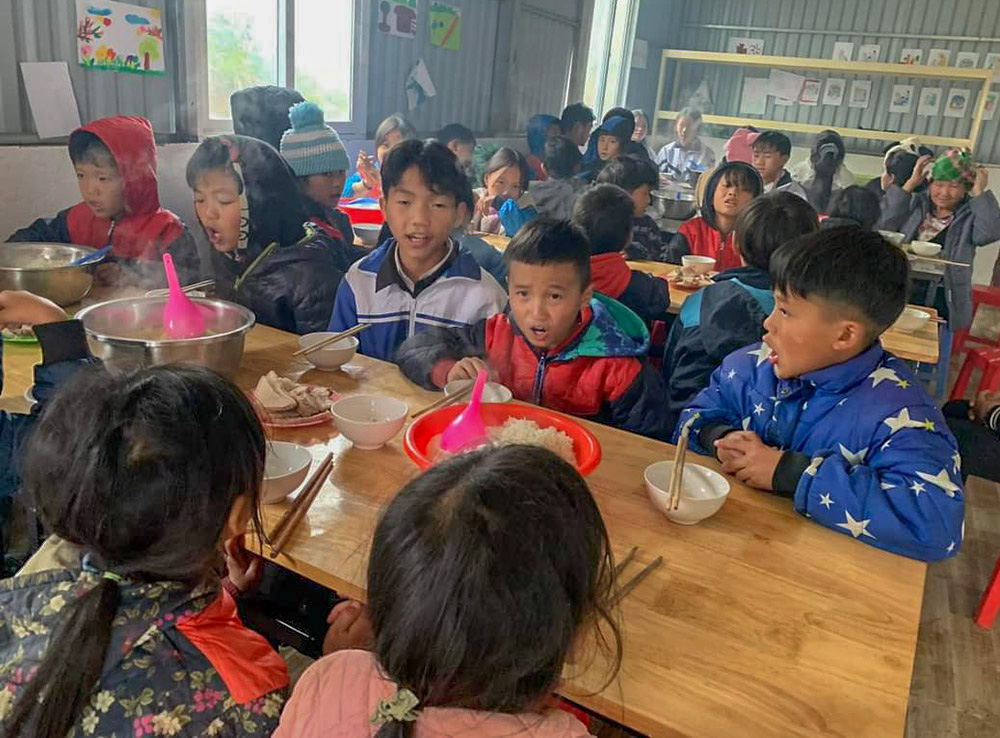Hmong children have lunch prepared by Sr. Mary Hoang Thi Phuong at Ban Phung Chapel after their catechism class. (Courtesy of Sr. Mary Hoang Thi Phuong)