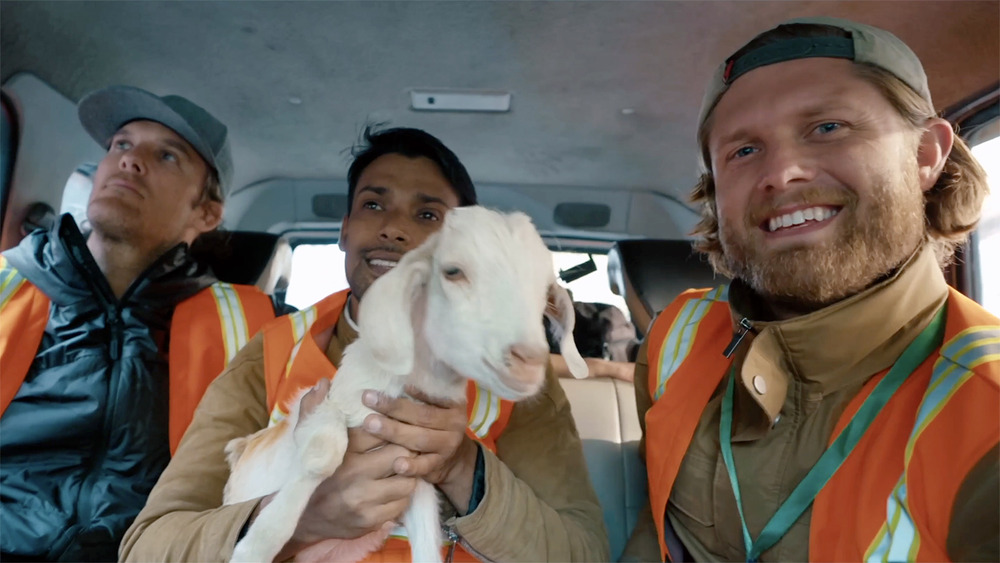 "Christpiracy" crew Three men, center man holds goat