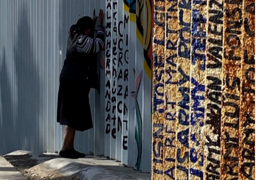 Sr. Florence Anyabuonwu prays at the border wall.