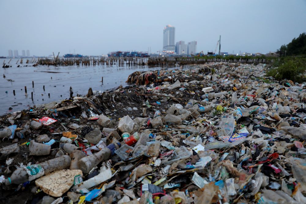 Rubbish, most of which is plastics, is seen along a shoreline in Jakarta, Indonesia, in this June 21, 2019, file photo.