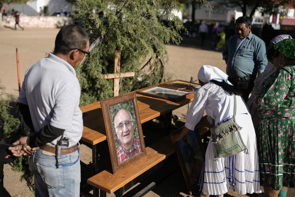 Cartel violence, murdered priests, Mexico elections People gather around outdoor altar