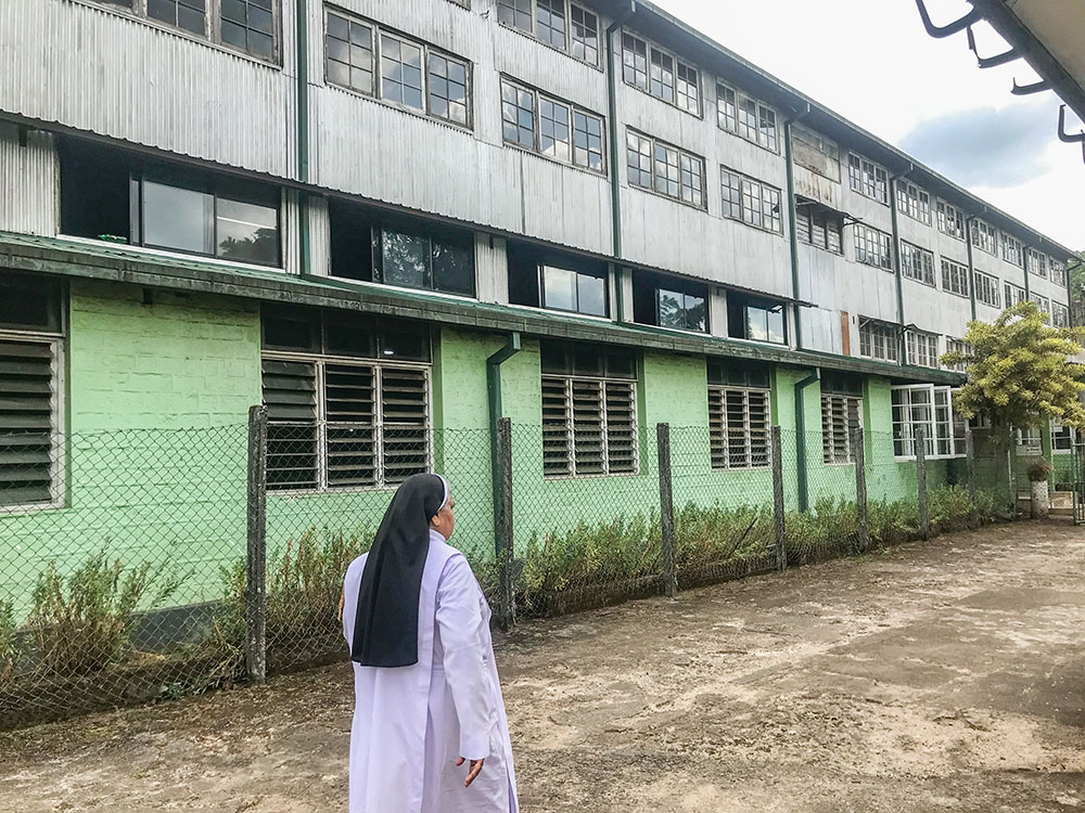 Apostolic Carmel Sr. Maria Amali visits a tea factory to interact with workers. (Thomas Scaria)