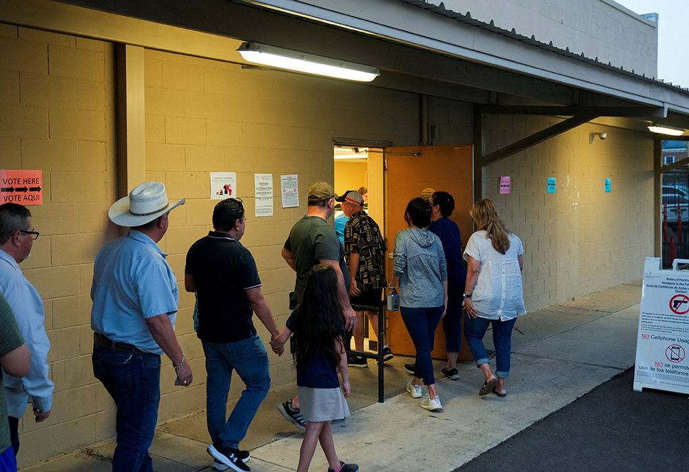 People stand in a line to vote shortly before the polls close in Edinburg, Texas, during the Super Tuesday primary election March 5, 2024. (OSV News/Reuters/Cheney Orr) People stand in a line to vote shortly before the polls close in Edinburg, Texas, during the Super Tuesday primary election March 5, 2024. (OSV News/Reuters/Cheney Orr)