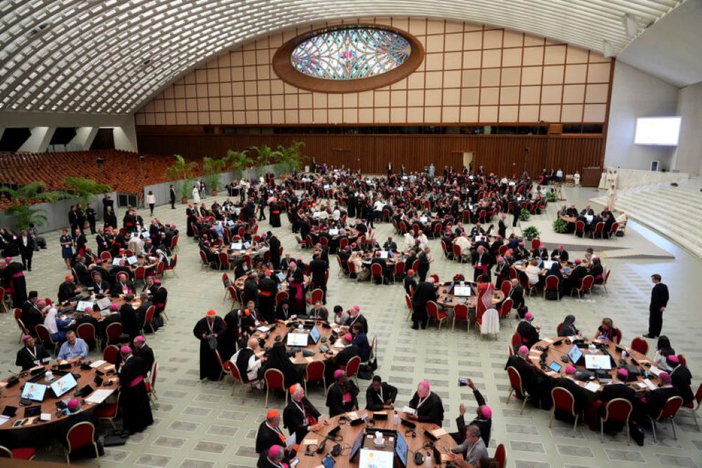 Pope Francis and delegates sit at round tables in the opening session of the 2023 synod on synodality. Pope Francis and delegates sit at round tables in the opening session of the 2023 synod on synodality.