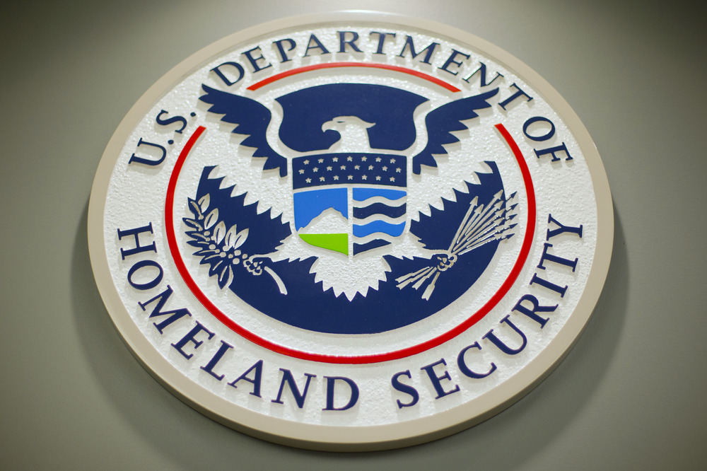 Seal for the U.S Department of Homeland Security. Seal on wall.