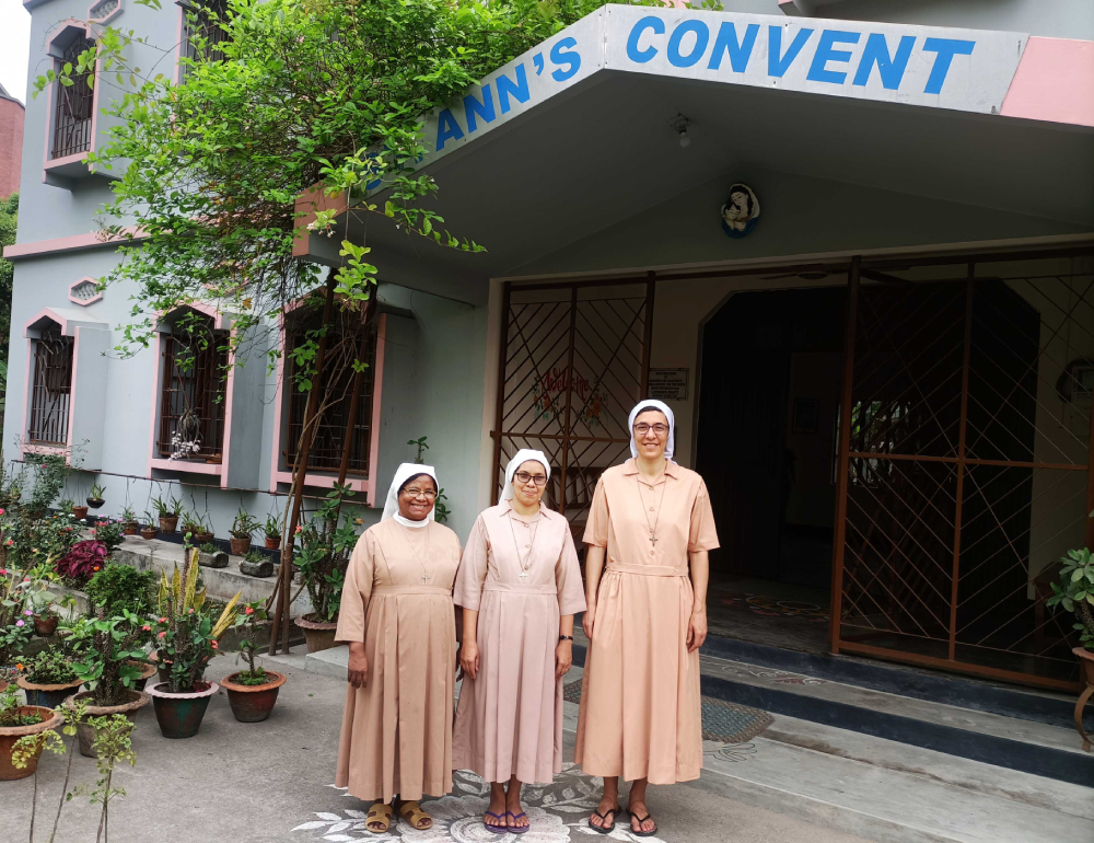Sr. Lorenza Raffaella Radini, Sr. Shiuli Beck, and Sr. Teresa Gomes Sr. Lorenza Raffaella Radini (right), Sr. Shiuli Beck, community leader (middle) and Sr. Teresa Gomes (left), who are in charge of the pastoral work, in front of the convent. (Stephan Uttom Rozario)