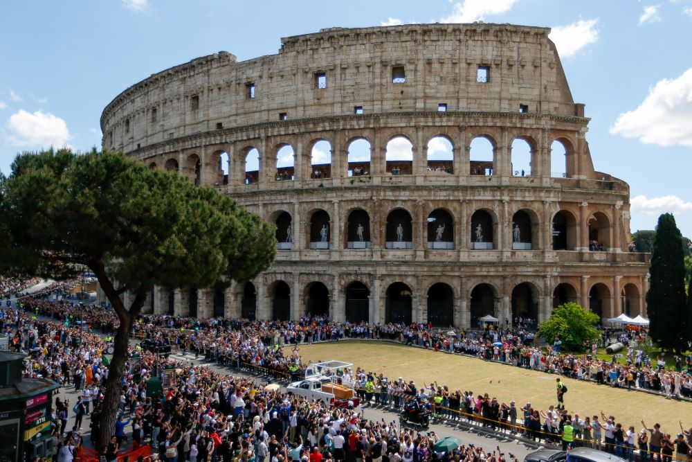 Pope Francis' casket is driven past the Colosseum on its way toward his burial place in Santa Maria Maggiore. (CNS/Justin McLellan)