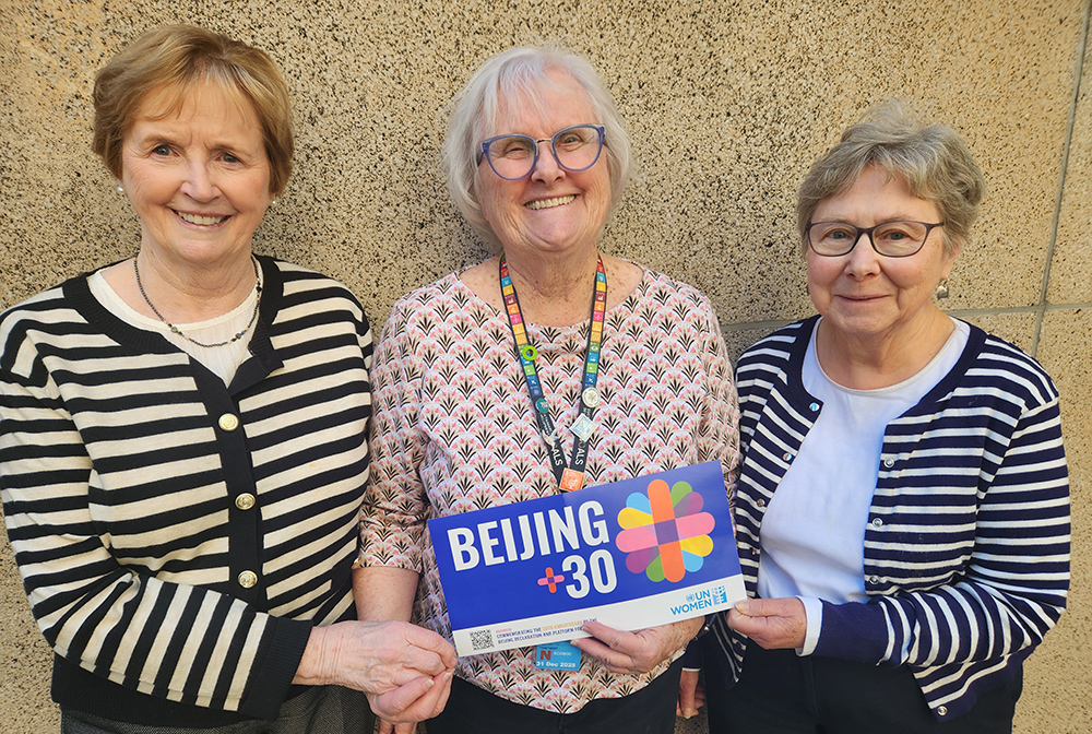 Displaying the theme of the United Nations' 69th Commission on the Status of Women — 30 years since the 1995 Beijing Declaration and Platform for Action — were, from left to right, Daughter of Wisdom Sr. Jean Quinn, who heads the U.N.-based advocacy group UNANIMA International; Adrian Dominican Sr. Durstyne "Dusty" Farnan, who represents the Dominican Leadership Conference at the U.N.; and Sr. Barbara Bozak, U.N. representative for the Congregation of Sisters of St. Joseph. (GSR photo/Chris Herlinger)