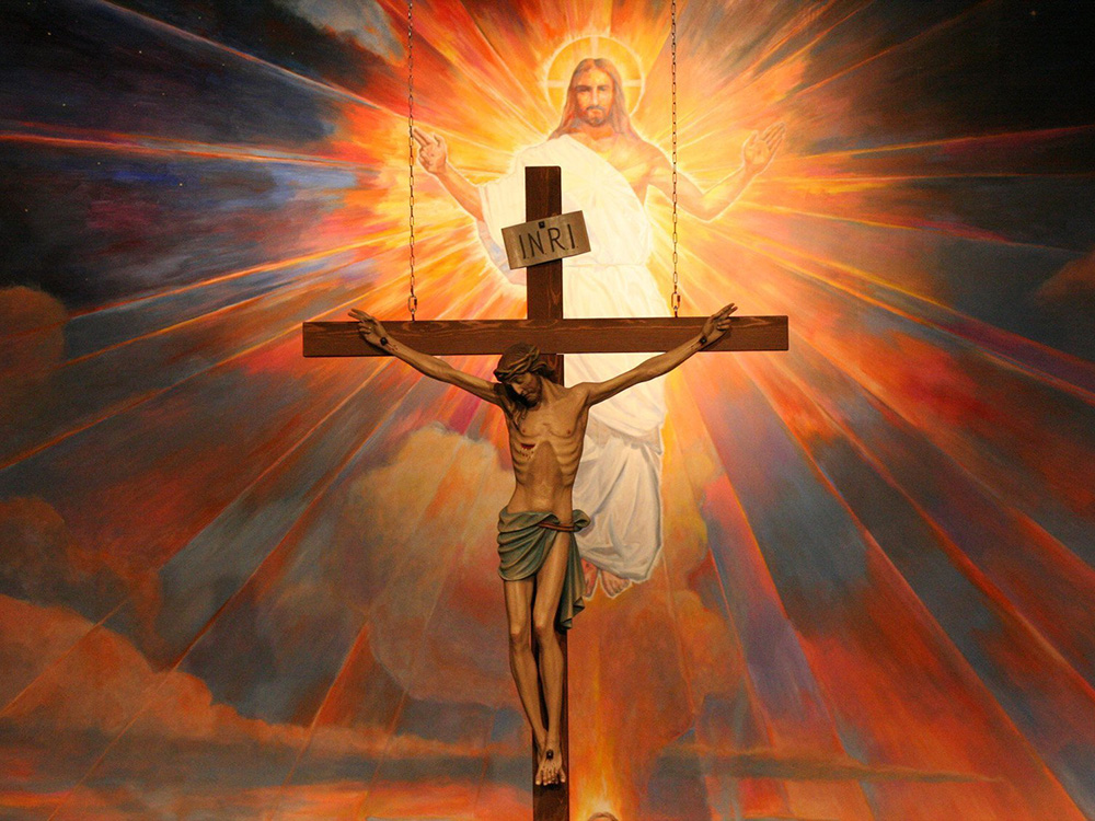 A crucifix hangs before a mural depicting the Resurrection in the sanctuary at St. Timothy Parish in Mesa, Arizona, in this undated file photo. (OSV News/Catholic Sun/J.D. Long-Garcia)