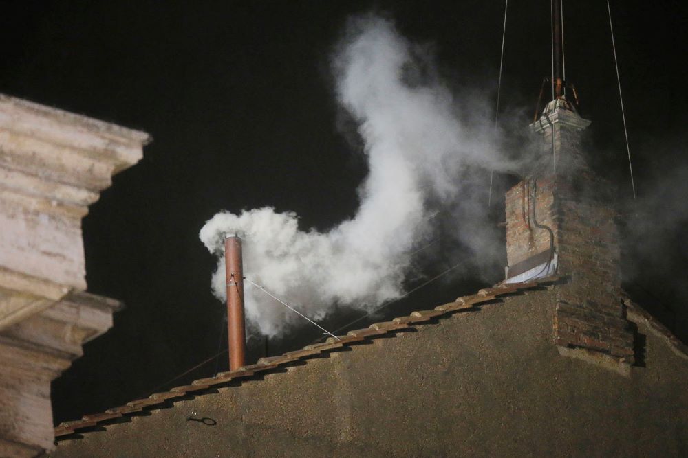 White smoke billows from the chimney of the Sistine Chapel. White smoke billows from the chimney of the Sistine Chapel.