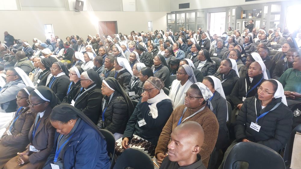 large group at symposium large group at symposium