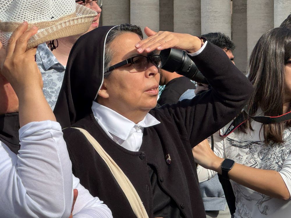 A Latin American sister waits in St. Peter’s Square after white smoke signals the election of a new pope at the Vatican May 8. (GSR photo/Rhina Guidos) A Latin American sister waits in St. Peter’s Square after white smoke signals the election of a new pope at the Vatican May 8. (GSR photo/Rhina Guidos)