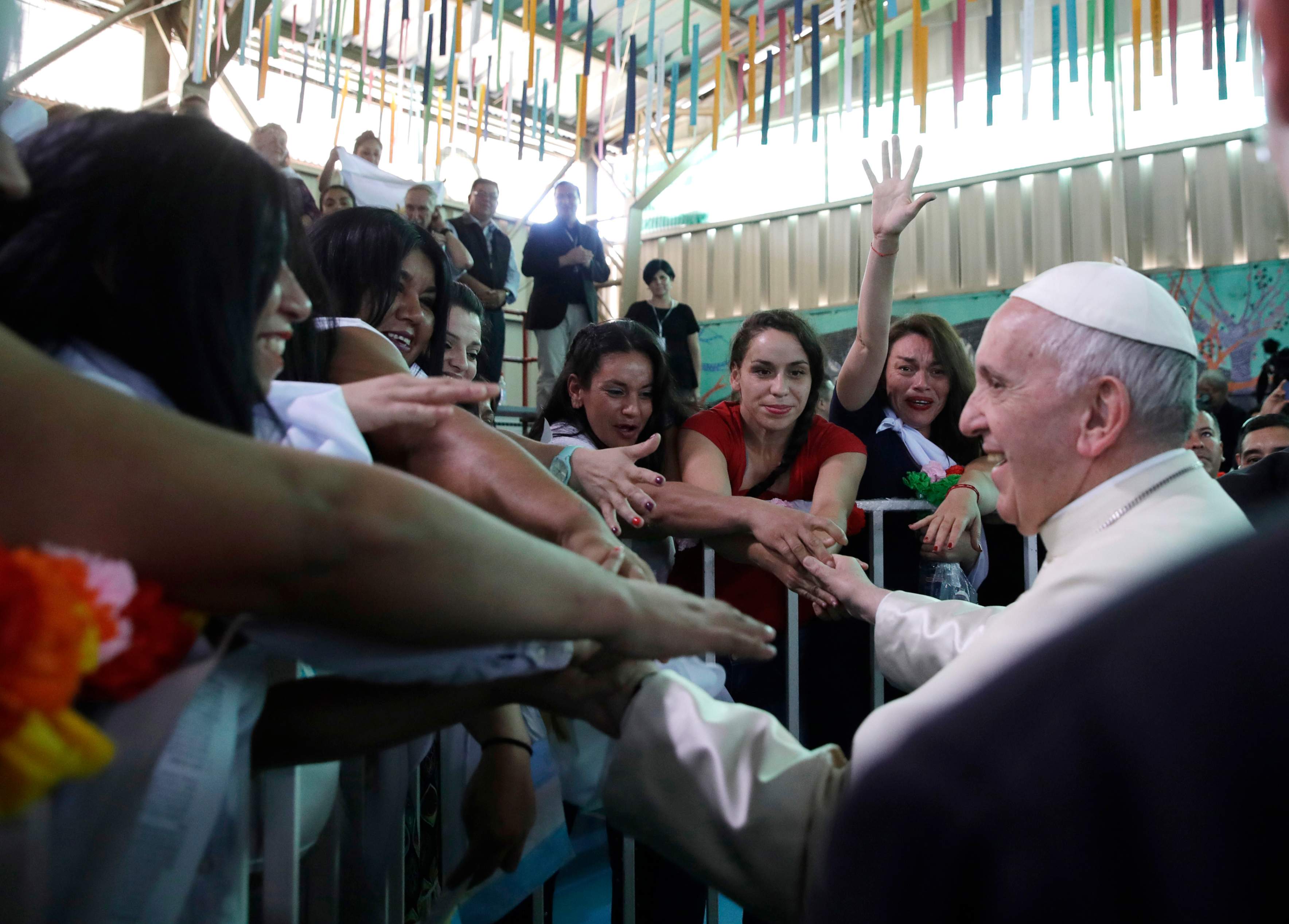 Pope Francis greets inmates at the San Joaquin women's prison in Santiago, Chile, Jan. 16, 2018. (AP/Alessandra Tarantino)