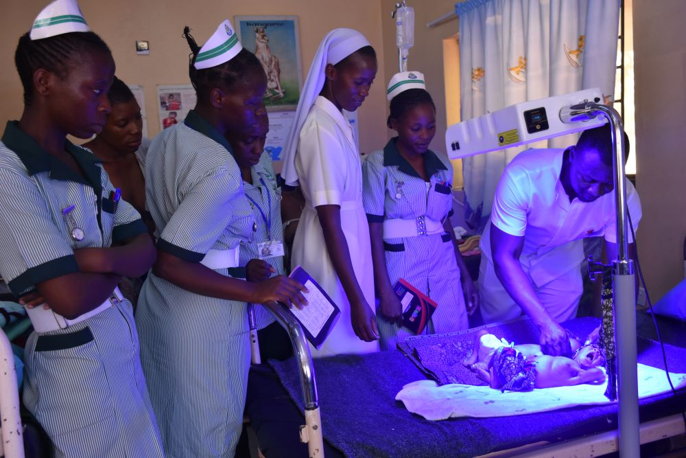 Sr. Joyce Miyanda (center), flanked by health care workers, inspects the neonatal ward at Monze Mission Hospital.  Sr. Joyce Miyanda (center), flanked by health care workers, inspects the neonatal ward at Monze Mission Hospital.
