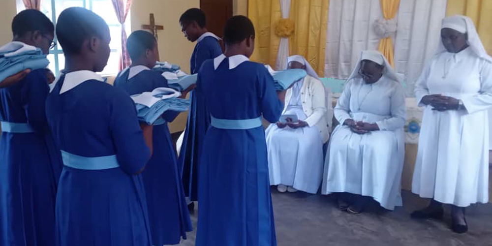 Postulants are pictured during the ceremony of entrance to the novitiate, at the novitiate house of the Sisters of Our Lady, Queen of Africa in Sumbawanga, Tanzania. (Courtesy of Editruda Mbegu)